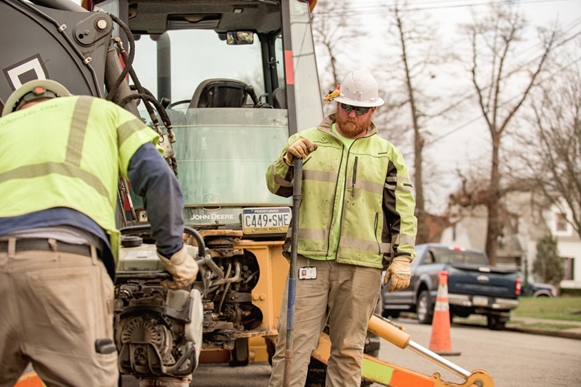 columbia gas worker inspecting gas meters